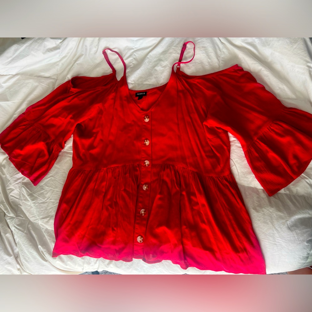 Excellent condition Torrid cold shoulder top. Size 1 (1XL) loose flowy